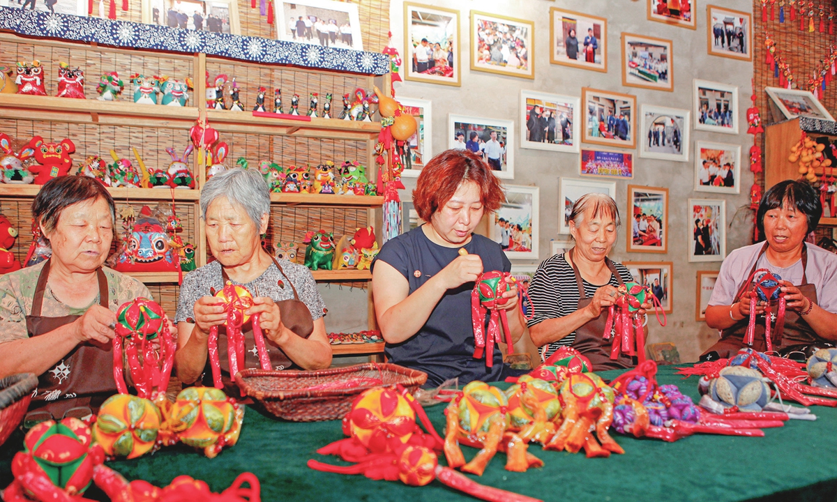 Female crafters are busy handcrafting 