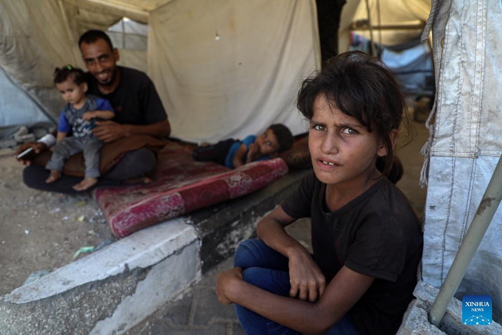Displaced Palestinian children are seen at a shelter in the west of Gaza City on July 26, 2025. (Photo: Xinhua)