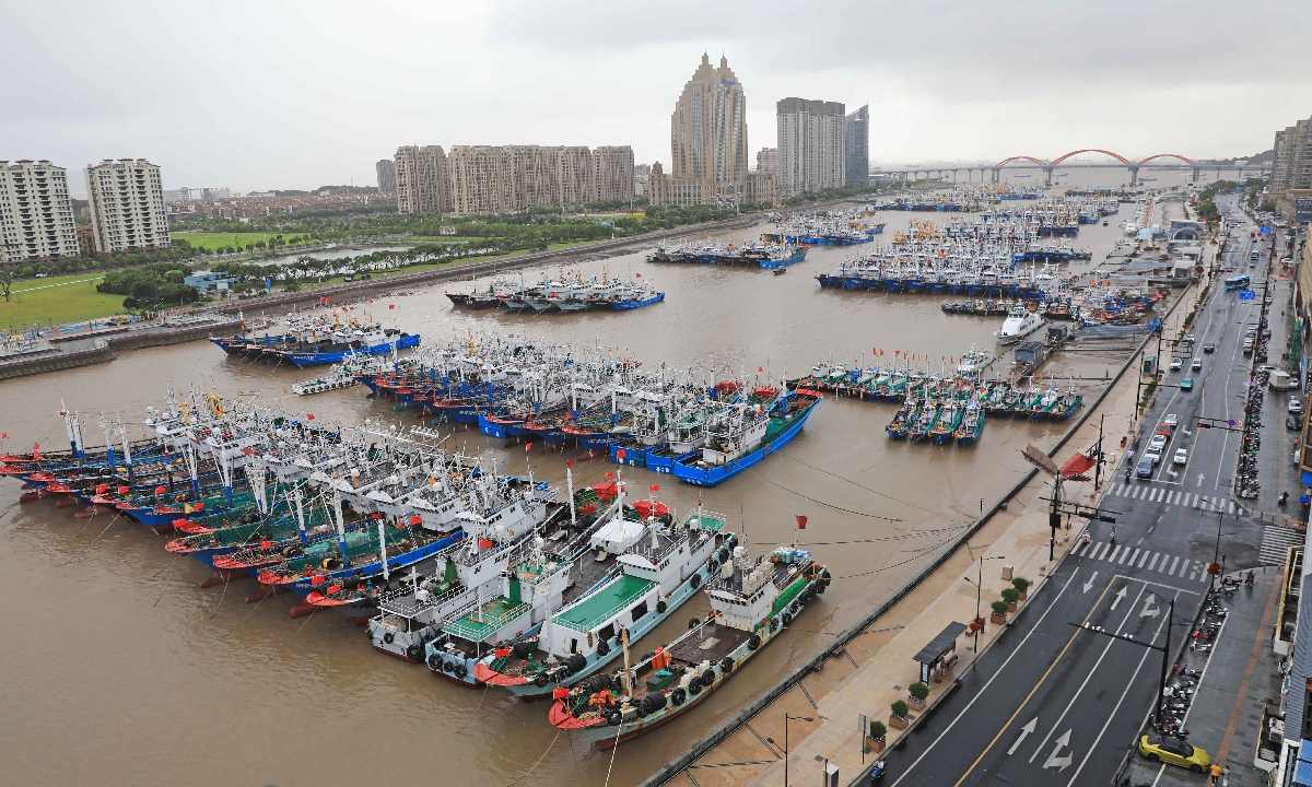 Affected by Typhoon Co-May, the eighth typhoon of the year affecting China,?fishermen from Zhoushan, East China's Zhejiang Province, dock their boats at Shenjiamen Fishing Port on July 28, 2025 to shelter from the typhoon. Photo: VCG