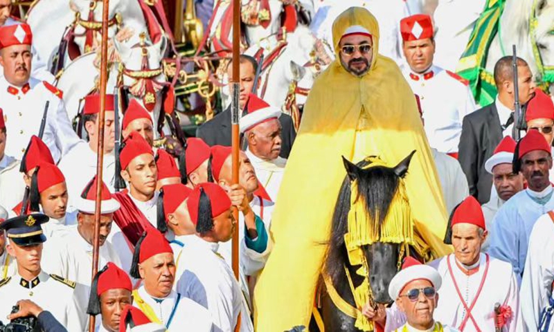 King Mohammed VI of Morocco warmly greets the people on Moroccan King's Day. Photo: Embassy of Morocco in China