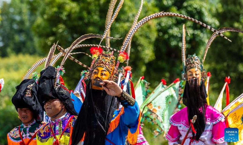 Actors take part in a Dixi opera parade at the Miaoling Tunpu scenic area in Xixiu District of Anshun City, southwest China's Guizhou Province, Aug. 2, 2025. Anshun Dixi Opera is an important part of Tunpu culture dating back to the Ming Dynasty (1368-1644). The opera has been listed as a national intangible cultural heritage item in 2006. Photo: Xinhua