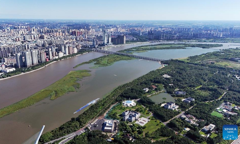 An aerial drone photo taken on July 30, 2025 shows a view of the Taiyangdao (Sun Island) National Wetland Park beside the urban area in Harbin, northeast China's Heilongjiang Province. Located on the north bank of the Songhua River in Harbin, the Taiyangdao (Sun Island) National Wetland Park has a wetland area of more than 7,000 hectares, with a high wetland rate of more than 70 percent. Among them, the Sun Island Scenic Area is one of the few riverfront wetland grassland ecological zones lying in the city center in China.

In midsummer, the charming scenery of the vibrant urban ecological island attracts numerous tourists. Photo: Xinhua