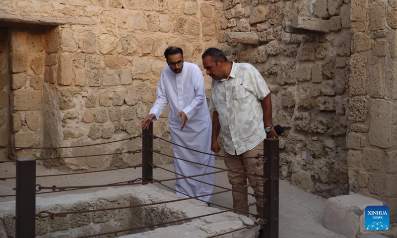 Tourists visit Qal'at al-Bahrain in the Northern Governorate, Bahrain, Aug. 2, 2025.

Situated on the northern coast of Bahrain Island, Qal'at al-Bahrain is an artificial mound created by many successive layers of human occupation. It was listed as a UNESCO World Heritage Site in 2005. Photo: Xinhua