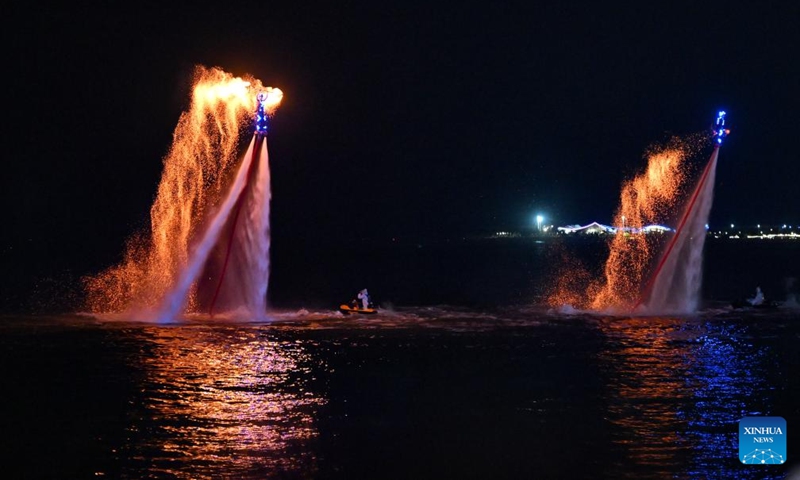 This photo taken on Aug. 2, 2025 shows a performance on the water at the opening ceremony of the 2025 (26th) Hainan Island Carnival in Haikou, south China's Hainan Province. The 2025 (26th) Hainan Island Carnival kicked off on Saturday here. With various activities arranged across the island, the event will last till Aug. 31. Photo: Xinhua