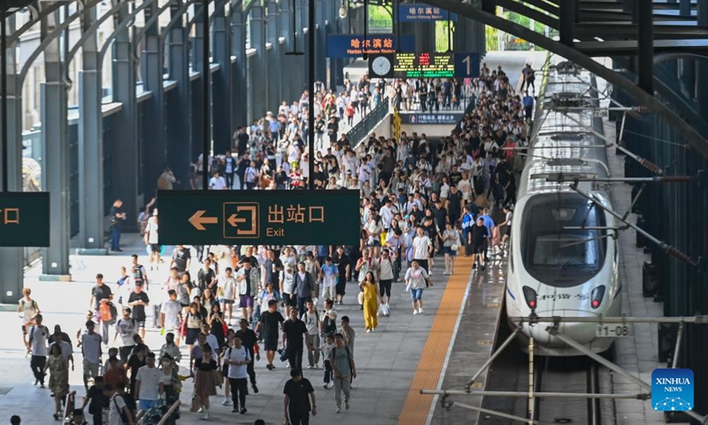 Passengers walk in Harbin Railway Station in Harbin, northeast China's Heilongjiang Province, Aug. 2, 2025. This year's summer travel rush will last for 62 days from July 1 to Aug. 31. From July 1 to 31, China Railway Harbin Bureau Group had handled 9.775 million passenger trips, and the daily average number of passenger trips reached 315,000. Photo: Xinhua
