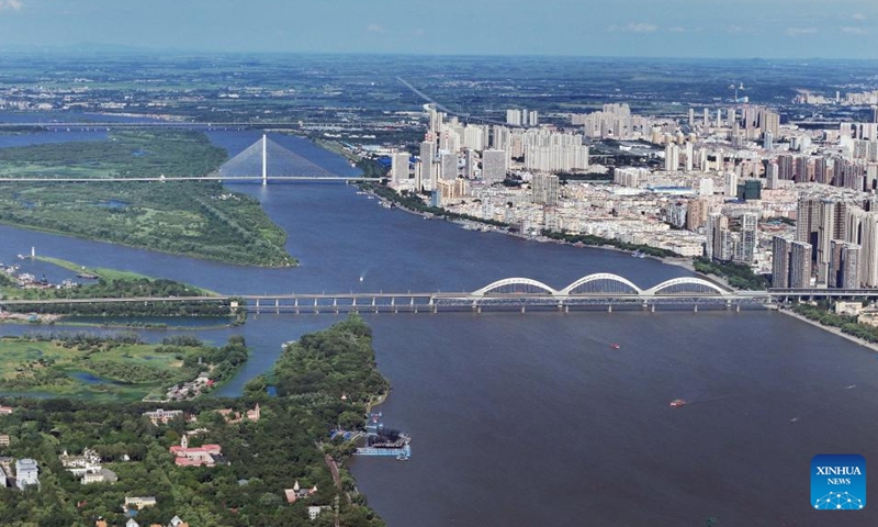 An aerial drone photo taken on July 30, 2025 shows a view of the Taiyangdao (Sun Island) National Wetland Park beside the urban area in Harbin, northeast China's Heilongjiang Province. Located on the north bank of the Songhua River in Harbin, the Taiyangdao (Sun Island) National Wetland Park has a wetland area of more than 7,000 hectares, with a high wetland rate of more than 70 percent. Among them, the Sun Island Scenic Area is one of the few riverfront wetland grassland ecological zones lying in the city center in China.

In midsummer, the charming scenery of the vibrant urban ecological island attracts numerous tourists. Photo: Xinhua