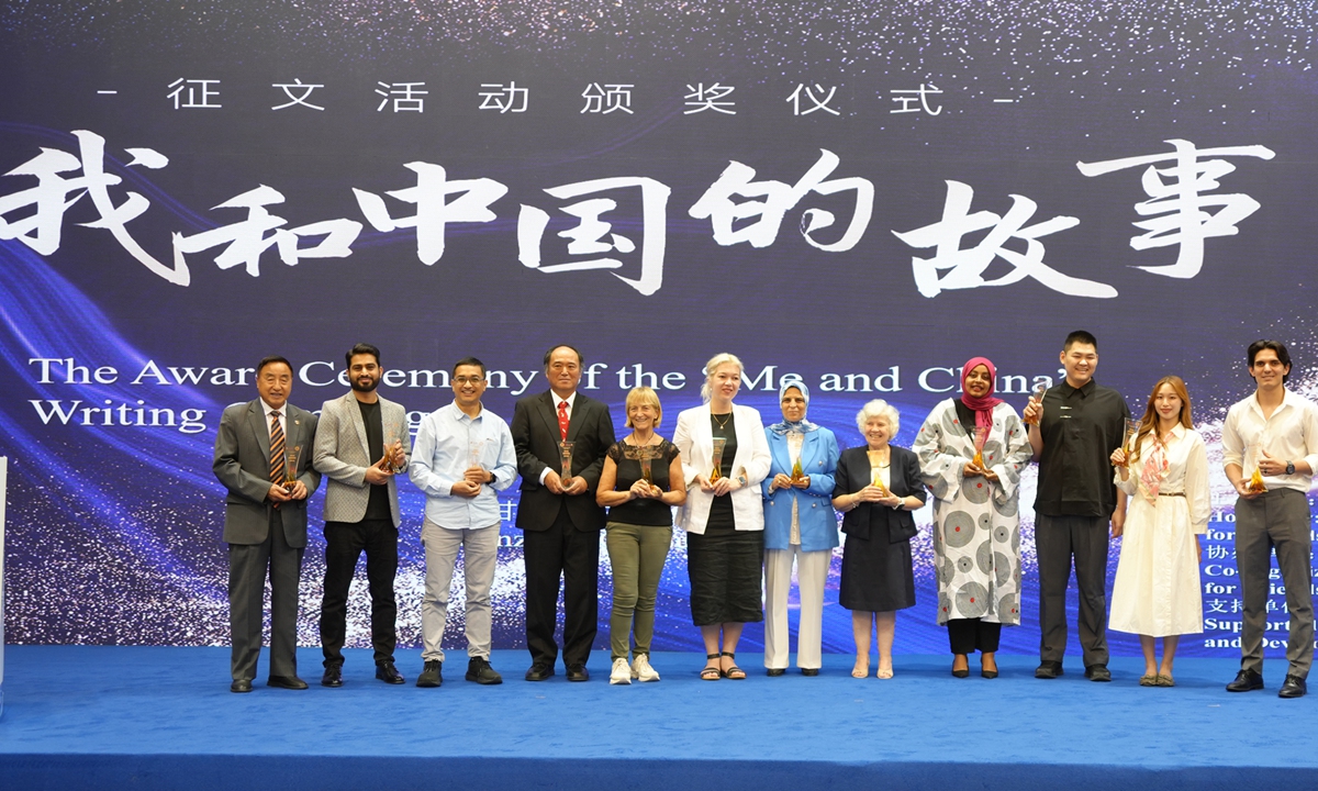 Award-winning participants pose for a group photo at the Award Ceremony of the 