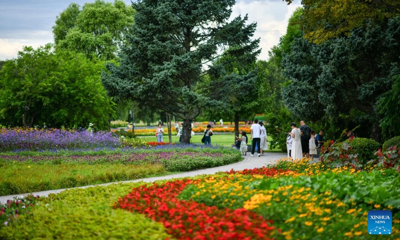 People visit the Sun Island Scenic Area in Harbin, northeast China's Heilongjiang Province, Aug. 1, 2025. Located on the north bank of the Songhua River in Harbin, the Taiyangdao (Sun Island) National Wetland Park has a wetland area of more than 7,000 hectares, with a high wetland rate of more than 70 percent. Among them, the Sun Island Scenic Area is one of the few riverfront wetland grassland ecological zones lying in the city center in China.

In midsummer, the charming scenery of the vibrant urban ecological island attracts numerous tourists. Photo: Xinhua
