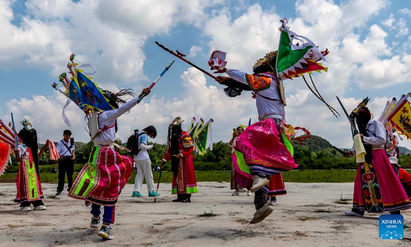 Actors stage a Dixi opera performance at the Miaoling Tunpu scenic area in Xixiu District of Anshun City, southwest China's Guizhou Province, Aug. 2, 2025. Anshun Dixi Opera is an important part of Tunpu culture dating back to the Ming Dynasty (1368-1644). The opera has been listed as a national intangible cultural heritage item in 2006. Photo: Xinhua