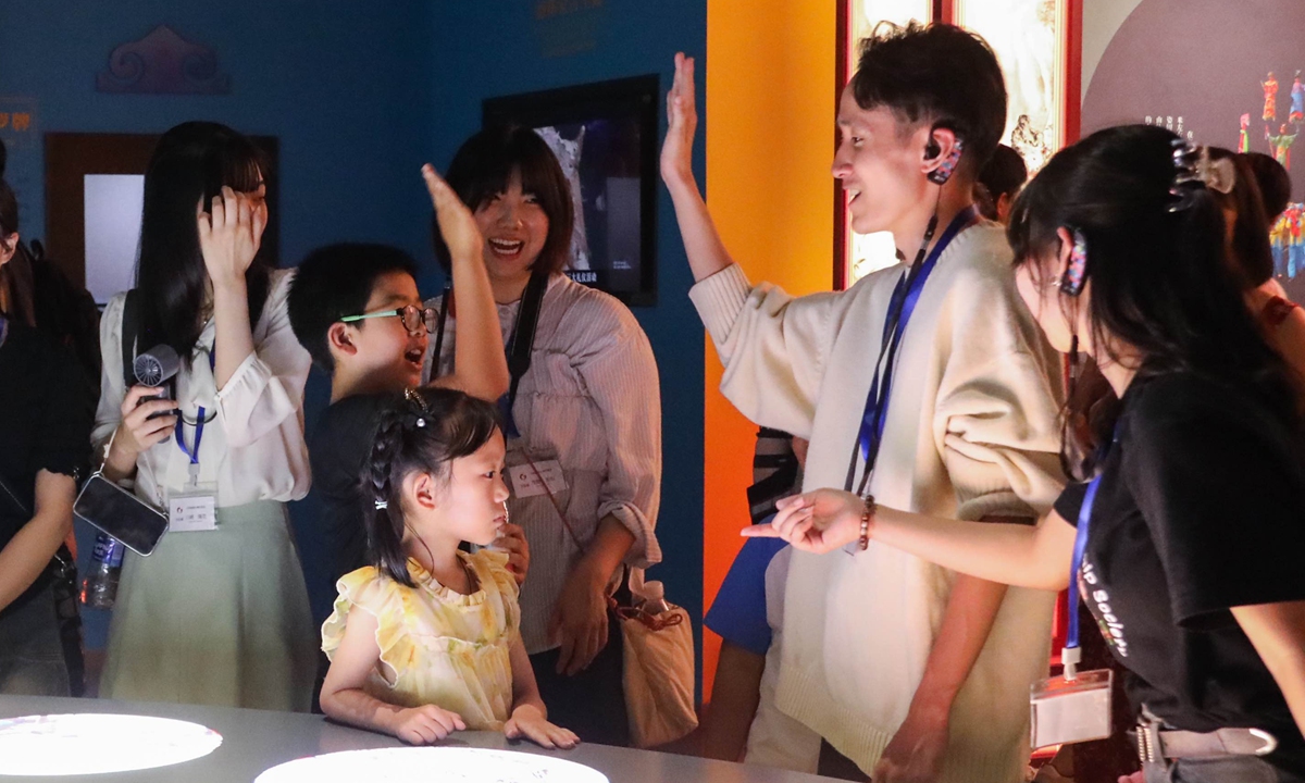 College students from Japan's Soka University and Qinghai Institute of Technology visit Qinghai Provincial Museum and interact with Chinese children in a China-Japan youth friendly exchange program in Xining, Northwest China's Qinghai Province on August 2, 2025. Photo: VCG