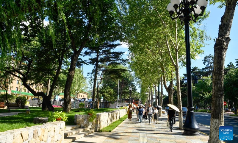 Tourists visit the Xinmin Avenue in Changchun, northeast China's Jilin Province, July, 30, 2025. Changchun's Xinmin Avenue is a historical major road first built in 1933. After a recent renovation, it reopened to the public on July 5.

Stretching 1,445 meters, the avenue underwent significant upgrades, creating an additional 4.5 hectares of urban space and 13 unique mini parks.

The avenue is flanked by buildings that once housed the State Council, ministries and a court of Manchukuo, the puppet state in northeast China after the region was taken by the Japanese army.

The Changchun History and Culture Museum, opening simultaneously, is located in the middle section of the avenue. The museum was converted from the former site of the office of the Changchun Daily. Photo: Xinhua