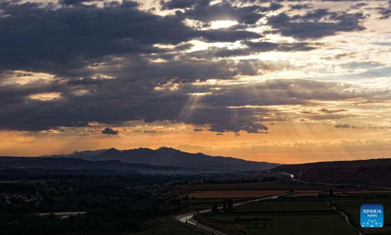 An aerial drone photo taken on Aug. 2, 2025 shows a sunset view of Koldeneng in Gongliu County of Ili Kazak Autonomous Prefecture, northwest China's Xinjiang Uygur Autonomous Region. Photo: Xinhua