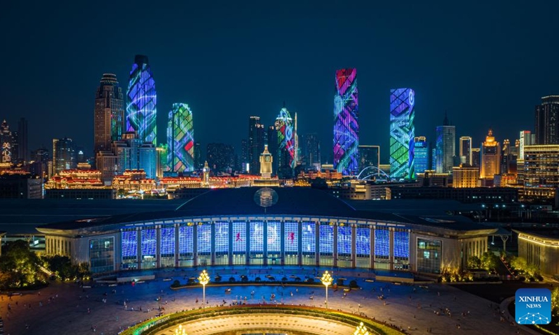 A drone photo taken on Aug. 1, 2025 shows a night view along the Haihe River near the Tianjin Railway Station in north China's Tianjin. To improve its urban landscape at night, Tianjin has upgraded the lighting installations for 216 buildings, 13 bridges, 8.2 kilometers of riverbanks and 7 piers along the Haihe River so far in 2025. Photo: Xinhua