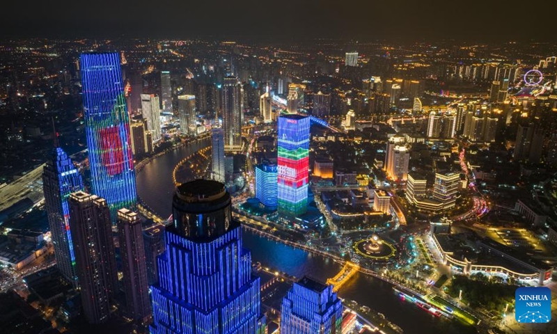 An aerial drone photo taken on Aug. 1, 2025 shows a night view along the Haihe River in north China's Tianjin. To improve its urban landscape at night, Tianjin has upgraded the lighting installations for 216 buildings, 13 bridges, 8.2 kilometers of riverbanks and 7 piers along the Haihe River so far in 2025. Photo: Xinhua