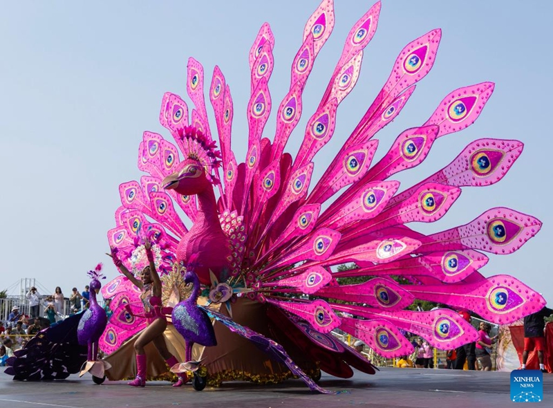 A dressed-up reveler performs with her float during the Grand Parade of the 2025 Toronto Caribbean Carnival in Toronto, Canada, on Aug. 2, 2025. This annual event was held here on Saturday to showcase Caribbean culture with thousands of masqueraders in stunning costumes. Photo: Xinhua