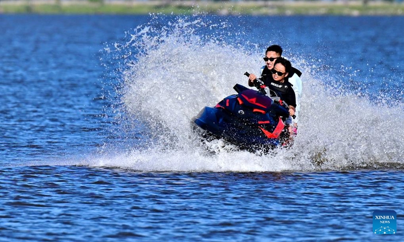 Tourists drive a motorboat on the Songhua River in Harbin, northeast China's Heilongjiang Province, on July 6, 2025.
Attracted by the coolness in summer, many tourists come to Harbin for vacation.
Taking advantage of its historical heritage, Harbin in recent years has accelerated the transformation of historical and cultural blocks and the utilization of old buildings, which has promoted the prosperity of the city's tourism industry. Photo: Xinhua