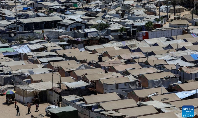 Tents for displaced Palestinians are seen at a temporary shelter in Gaza City, on Aug. 4, 2025. Gaza-based health authorities on Monday said at least 9,440 Palestinians have been killed and 37,986 others injured since Israel renewed its intensive strikes in Gaza on March 18, bringing the total death toll since October 2023 to 60,933, and injuries to 150,027. (Photo by Rizek Abdeljawad/Xinhua)