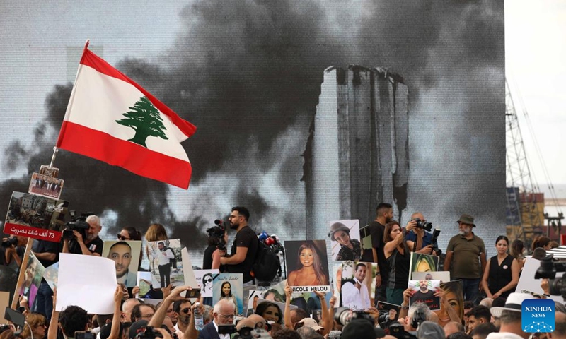 People take part in a march to commemorate the victims of the Beirut port blast in Beirut, Lebanon, on Aug. 4, 2025. Hundreds of people, including families of the victims and wounded from the catastrophic Beirut port explosion in 2020, gathered here on Monday in Martyrs' Square and marched toward the port to commemorate the tragedy. (Photo by Bilal Jawich/Xinhua)