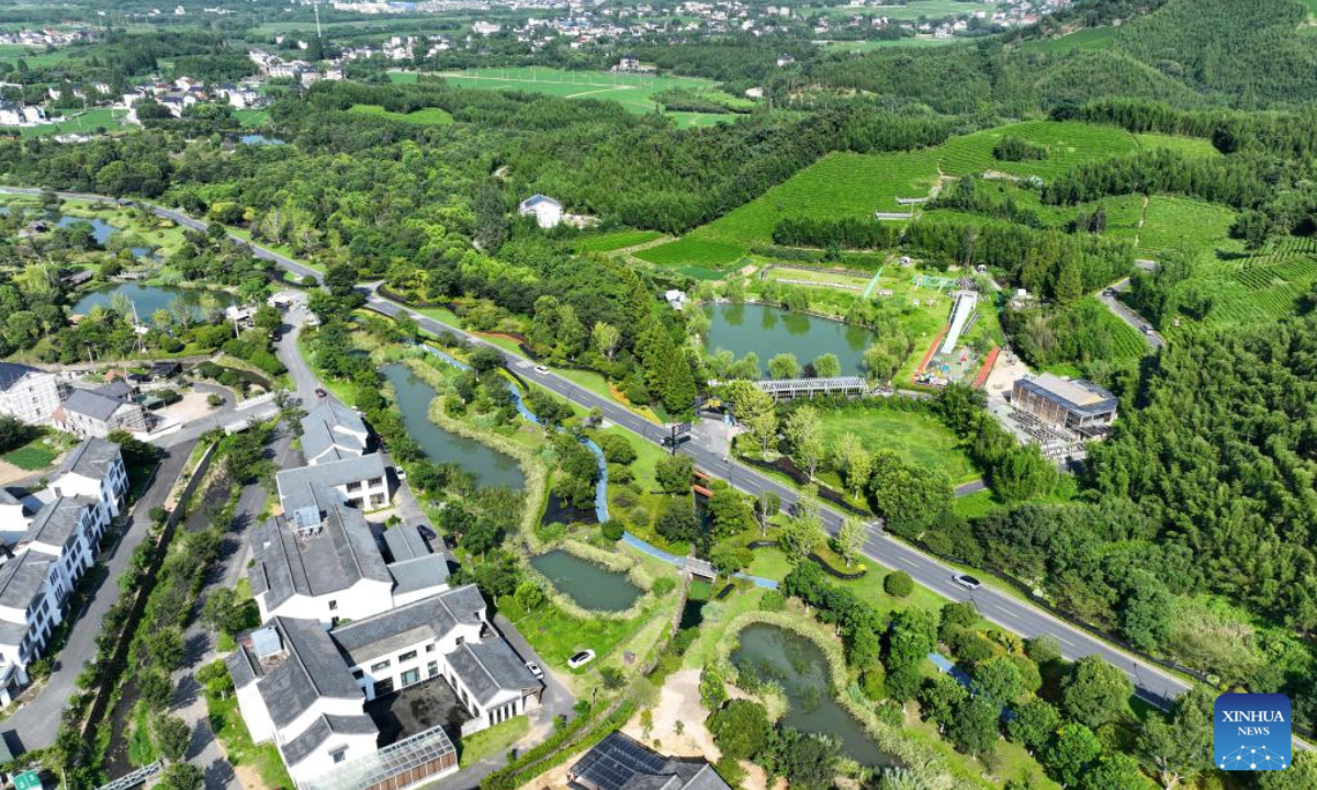 An aerial drone photo taken on Aug. 5, 2025 shows a view of Jingshan Village in Yuhang District of Hangzhou City, east China's Zhejiang Province. Jingshan Village, located in Yuhang District of Hangzhou City, east China's Zhejiang Province, is celebrated for its top-notch forest coverage rate of over 96 percent.

In recent years, the village has been boosting coordinated development of its tea industry and tourist service through creative projects such as digital tea gardens and low-carbon homestays, aiming to convert ecological advantages into economic propellers. (Xinhua/Mao Zhu)