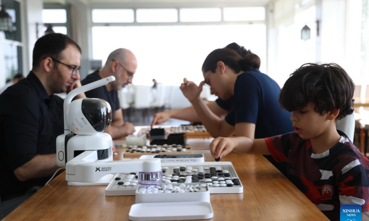 People play Go in Ankara, Türkiye, on Aug. 5, 2025. Once little known in Türkiye, the traditional Chinese board game Go, known by its Chinese name Weiqi, is gaining remarkable popularity as a cultural bridge connecting Türkiye and China. With roots stretching back thousands of years, Go is now being rediscovered by a new generation of Turkish players drawn to its depth, elegance, and cultural heritage. (Mustafa Kaya/Handout via Xinhua)
