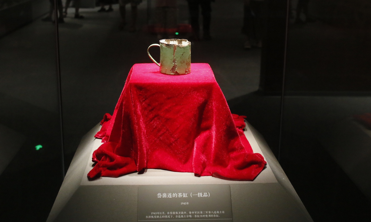 The enamel tin mug from the Daigu battle on display at an exhibition commemorating the 80th anniversary of the victory of the Chinese People's War of Resistance Against Japanese Aggression at the Shandong Museum, Jinan, East China's Shandong Province Photo: Shan Jie/GT