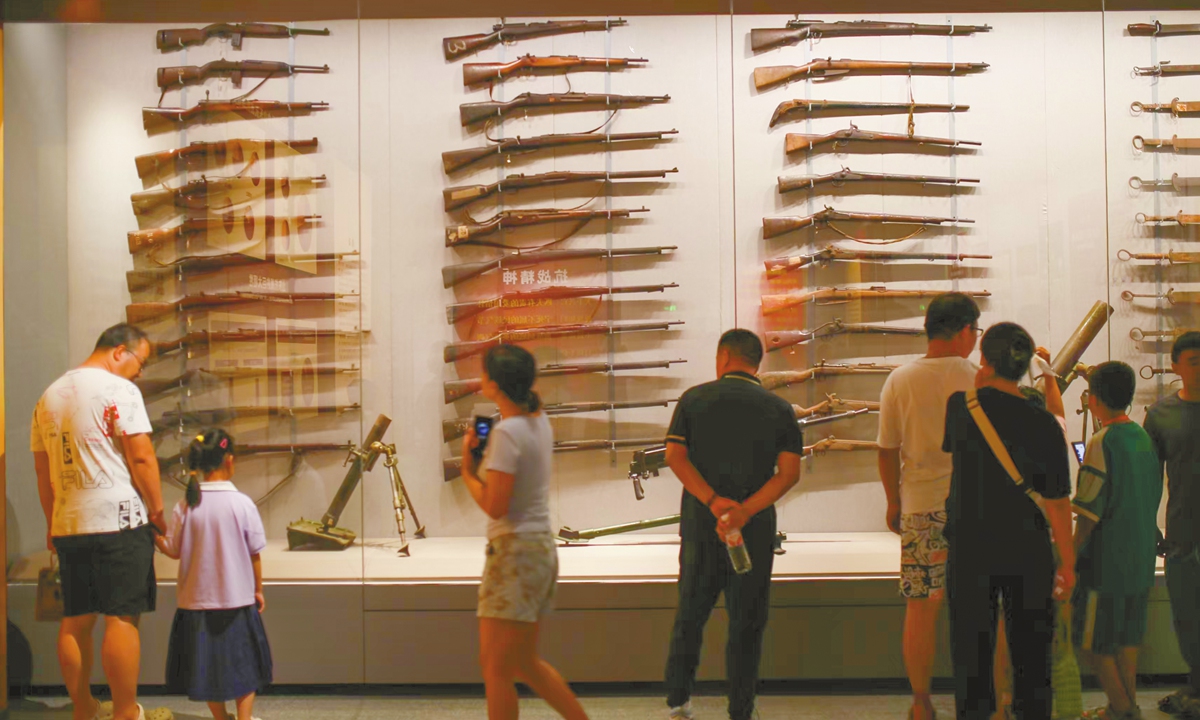 Visitors view exhibits at an exhibition commemorating the 80th anniversary of victory in the Chinese People's War of Resistance Against Japanese Aggression at the  Shandong Museum, Jinan, East China's Shandong Province, on July 26, 2025. Photo: Shan Jie/GT