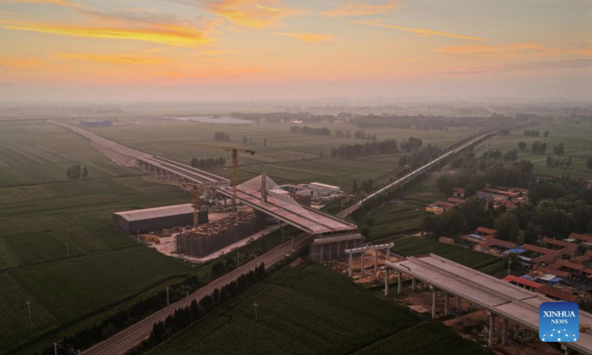 An aerial drone photo taken on Aug. 6, 2025 shows a cable-stayed bridge after its rotation in Dezhou, east China's Shandong Province. A 23,500 tonnes cable-stayed bridge, part of the highway linking Dezhou of east China's Shandong Province and Shangrao of east China's Jiangxi Province, was rotated to its target position on Wednesday. (Photo by Wang Guansheng/Xinhua)