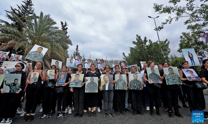 People take part in a march to commemorate the victims of the Beirut port blast in Beirut, Lebanon, on Aug. 4, 2025. Hundreds of people, including families of the victims and wounded from the catastrophic Beirut port explosion in 2020, gathered here on Monday in Martyrs' Square and marched toward the port to commemorate the tragedy. (Photo by Bilal Jawich/Xinhua)
