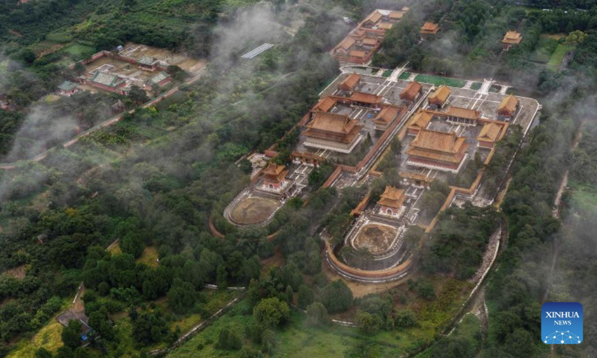 An aerial drone photo taken on Aug. 5, 2025 shows the scenery of mist-shrouded eastern royal tombs of the Qing Dynasty (1644-1911) in Zunhua City, north China's Hebei Province. (Photo by Liu Mancang/Xinhua)