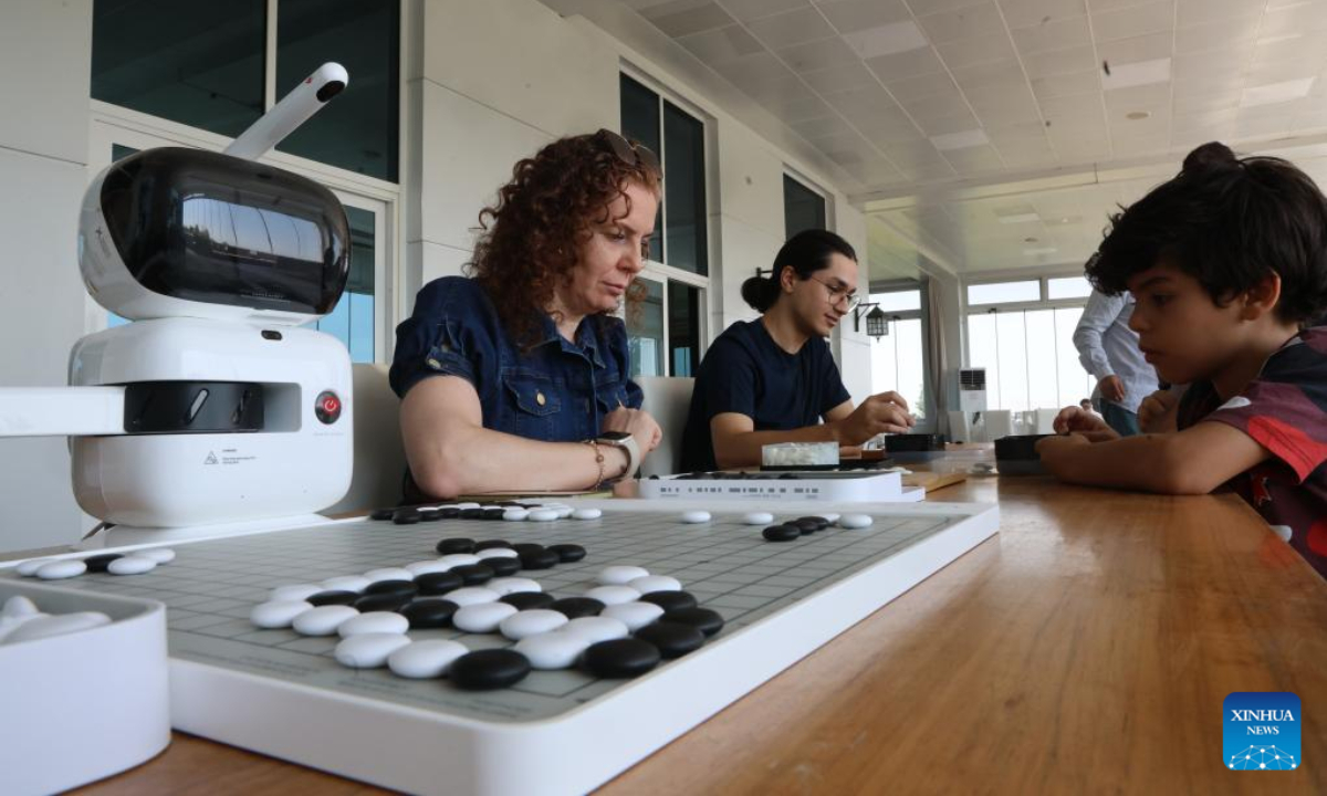 People play Go in Ankara, Türkiye, on Aug. 5, 2025. Once little known in Türkiye, the traditional Chinese board game Go, known by its Chinese name Weiqi, is gaining remarkable popularity as a cultural bridge connecting Türkiye and China. With roots stretching back thousands of years, Go is now being rediscovered by a new generation of Turkish players drawn to its depth, elegance, and cultural heritage. (Mustafa Kaya/Handout via Xinhua)