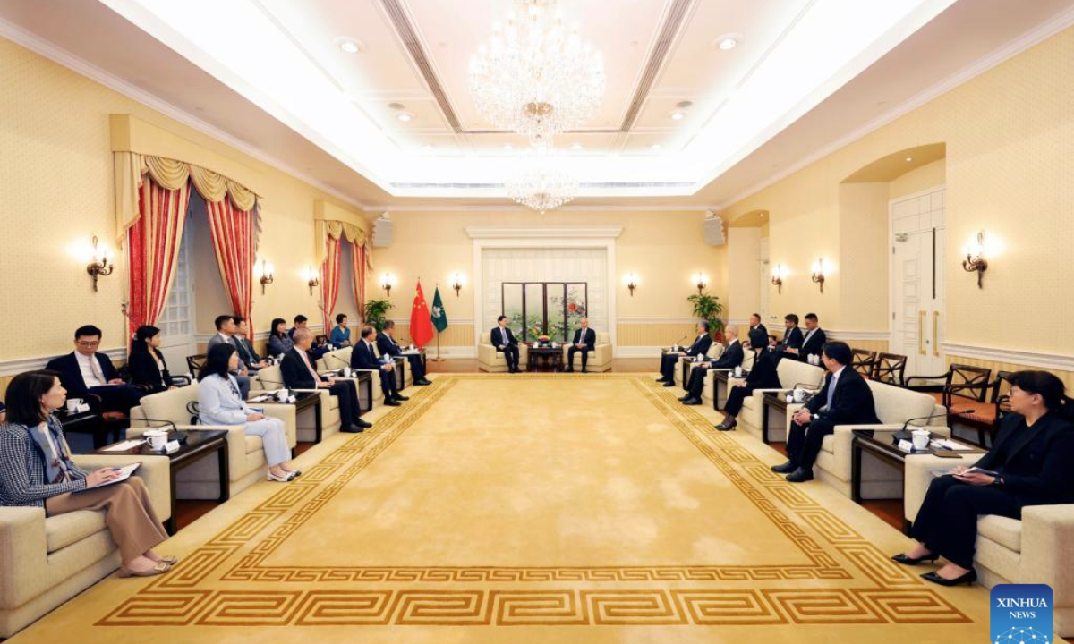 Sam Hou Fai, chief executive of China's Macao Special Administrative Region (SAR), meets with John Lee, chief executive of the Hong Kong Special Administrative Region, at the government headquarters of the Macao SAR in Macao, south China, Aug. 5, 2025. (Xinhua)