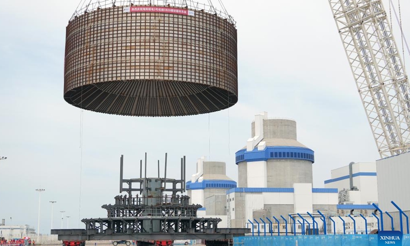 A crane lifts the CB20 module of the nuclear island for the 3rd unit of the Haiyang Nuclear Power Plant in Haiyang, east China's Shandong Province, Aug. 4, 2025. The CB20 module was successfully lifted and positioned on Monday, marking the completion of all major module installations for the 3rd unit of the Haiyang Nuclear Power Plant and the start of equipment installation and commissioning phase. (Photo by Tang Ke/Xinhua)