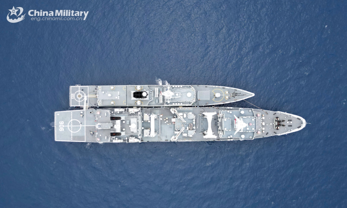 The guided-missile frigate Dali (Hull 553) attached to a flotilla with the navy under the Chinese PLA Southern Theater Command practices replenishment-at-sea with the comprehensive supply ship Honghu (Hull 906) during a maritime emergency supply training exercise in late July, 2025. (eng.chinamil.com.cn/Photo by Lyu Ge)