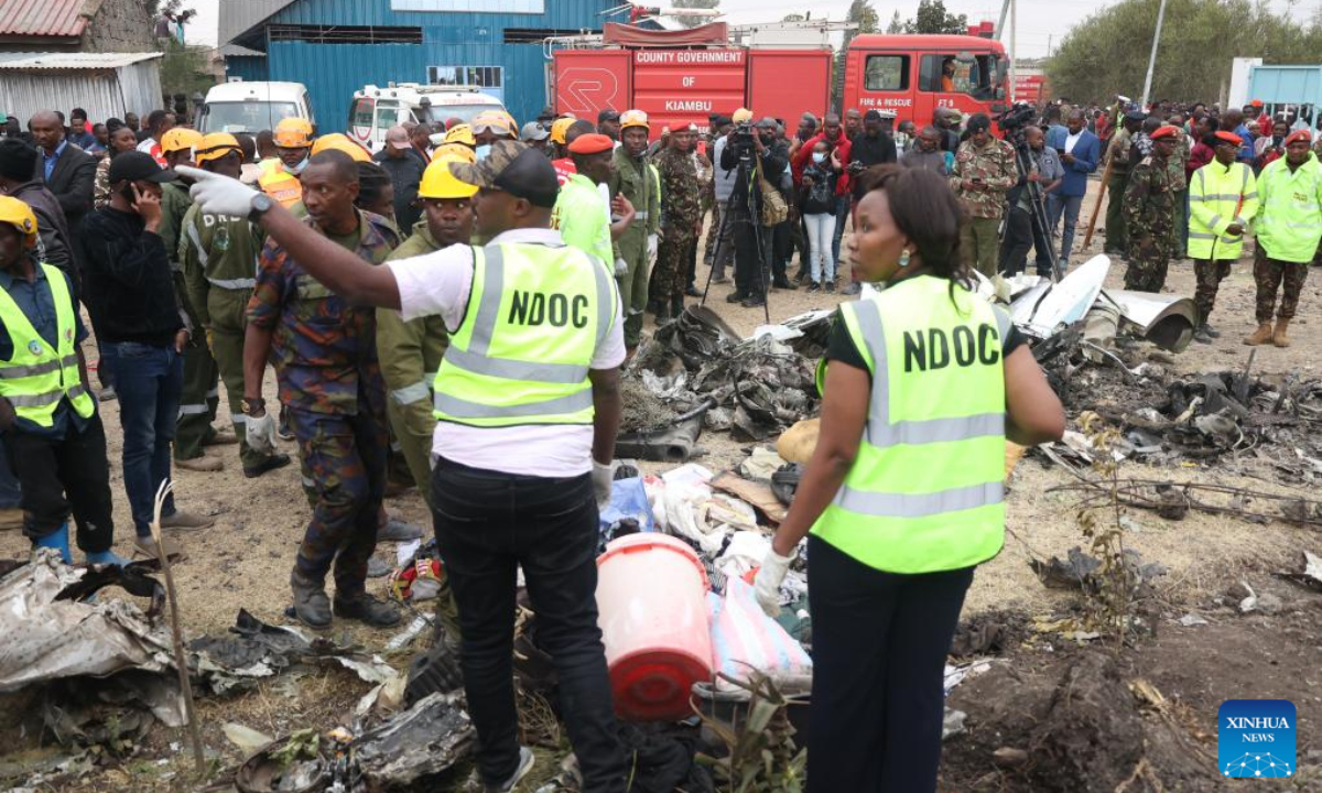 Rescuers work at the site of a plane crash in the Mwihoko area, on the outskirts of Nairobi, Kenya, on Aug. 7, 2025. At least six people were confirmed dead and two others injured after a light aircraft belonging to AMREF Flying Doctors crashed in the residential area on the outskirts of Nairobi, a government official confirmed. (Photo by John Okoyo/Xinhua)