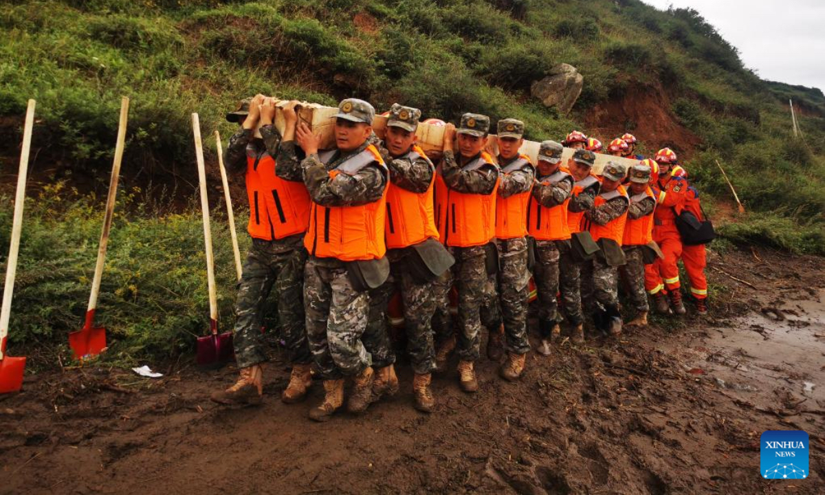 Rescuers work at the disaster-affected area of Mapo Township of Yuzhong County, Lanzhou City, northwest China's Gansu Province, Aug. 9, 2025. Rescue efforts are underway after continuous heavy rainfall triggered mountain torrents in Yuzhong County. (Photo by Zhang Xiangang/Xinhua)