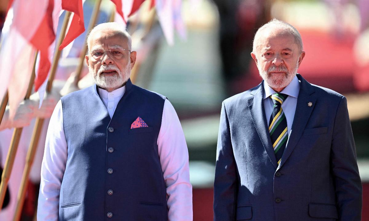 India's Prime Minister Narendra Modi (L) and Brazil's President Luiz Inacio Lula da Silva listen to their national anthems during a welcome ceremony at Alvorada Palace in Brasilia, on July 8, 2025. File photo: VCG