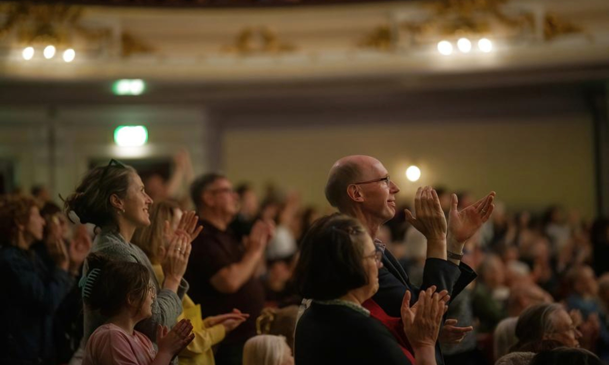 Audience applaud for a concert performed by the China National Centre for the Performing Arts (NCPA) Orchestra at the Usher Hall in Edinburgh, Scotland of Britain, Aug. 6, 2025. (Photo by Niu Xiaobei/Xinhua)