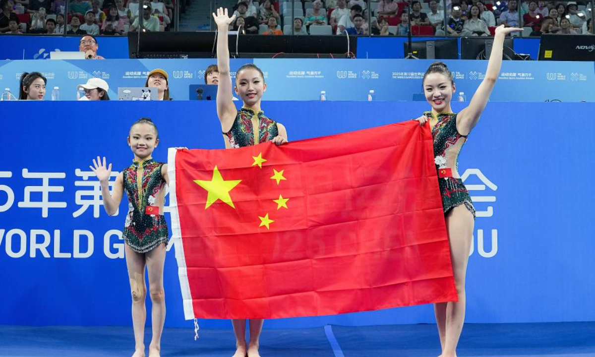 China's Gu Quanjia, Ding Wenyan and Ma Yixing (L-R) celebrate after the women's groups final of the acrobatic gymnastics event at The World Games 2025 in Chengdu, southwest China's Sichuan Province, Aug. 9, 2025. (Xinhua/Wang Xi)
