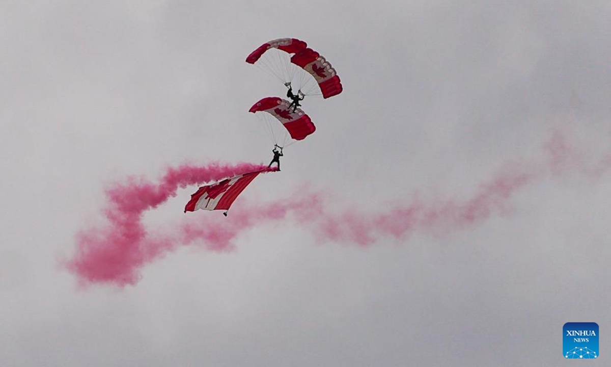Members of the Canadian Armed Forces Parachute Team, the SkyHawks, perform during the 2025 Abbotsford International Airshow in Abbotsford, British Columbia, Canada, on Aug. 8, 2025. As one of the largest of its kind in North America, the three-day airshow kicked off here on Friday. (Photo by Liang Sen/Xinhua)