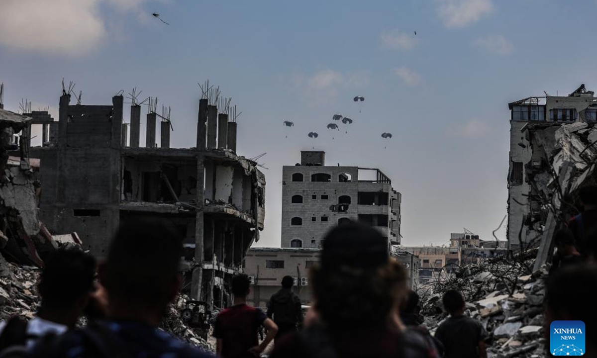 Humanitarian aid is airdropped over the Gaza City, on Aug. 8, 2025. (Photo by Rizek Abdeljawad/Xinhua)