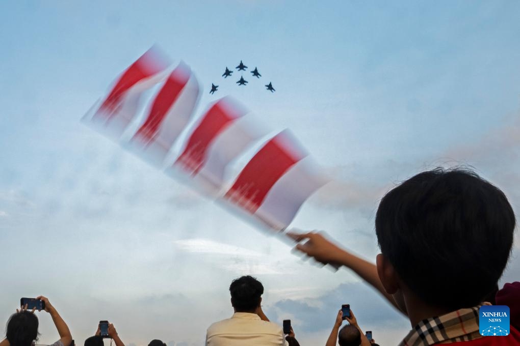 F-15SG fighters of the Singapore Armed Forces perform during the National Day celebrations in Singapore, on Aug. 9, 2025. Singapore celebrated the 60th anniversary of its independence on Saturday. (Photo by Then Chih Wey/Xinhua)
