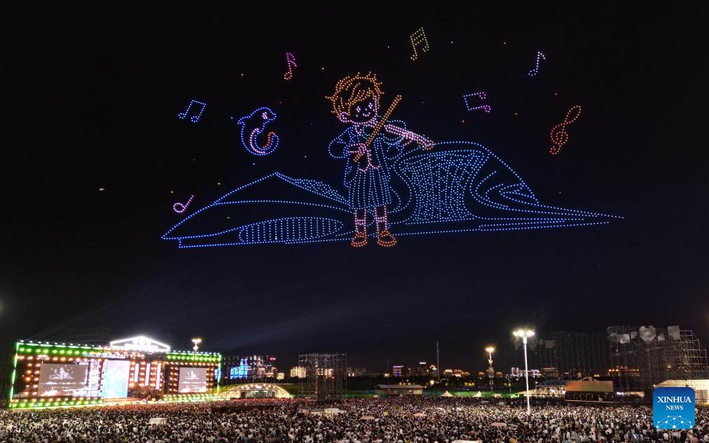 This photo taken on Aug. 8, 2025 shows a scene during a drone performance at the Harbin Ice and Snow World in Harbin, northeast China's Heilongjiang Province. A fleet of 3,000 drones presented a visual feast for tourists at the Harbin Ice and Snow World on Friday night. (Photo by Liu Yang/Xinhua)