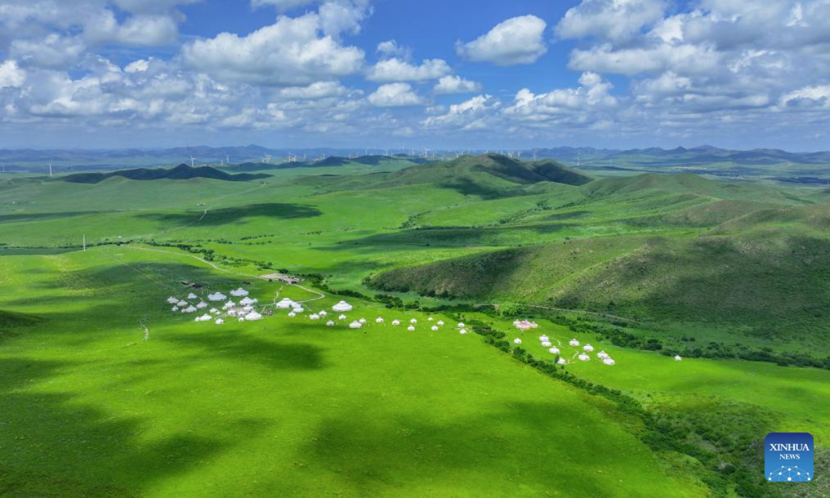 An aerial drone photo taken on July 28, 2025 shows a view of the grassland in Jarud Banner of Tongliao City, north China's Inner Mongolia Autonomous Region. The grassland, located in the northwest of Tongliao and at the south foot of the Greater Khingan Mountains, presents picturesque scenery during the rainy seasons. (Xinhua/Lian Zhen)