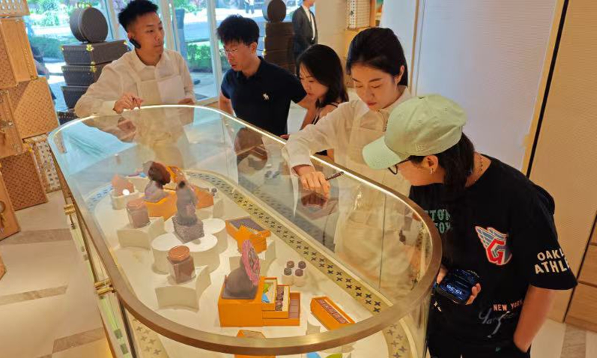 The first LV chocolate store in China, located in Pudong New Area, Shanghai, attracts many customers who are lining up to enter and make purchases on July 23, 2024. Photo: VCG