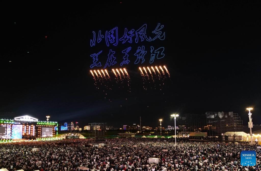 This photo taken on Aug. 8, 2025 shows a scene during a drone performance at the Harbin Ice and Snow World in Harbin, northeast China's Heilongjiang Province. A fleet of 3,000 drones presented a visual feast for tourists at the Harbin Ice and Snow World on Friday night. (Photo by Liu Yang/Xinhua)