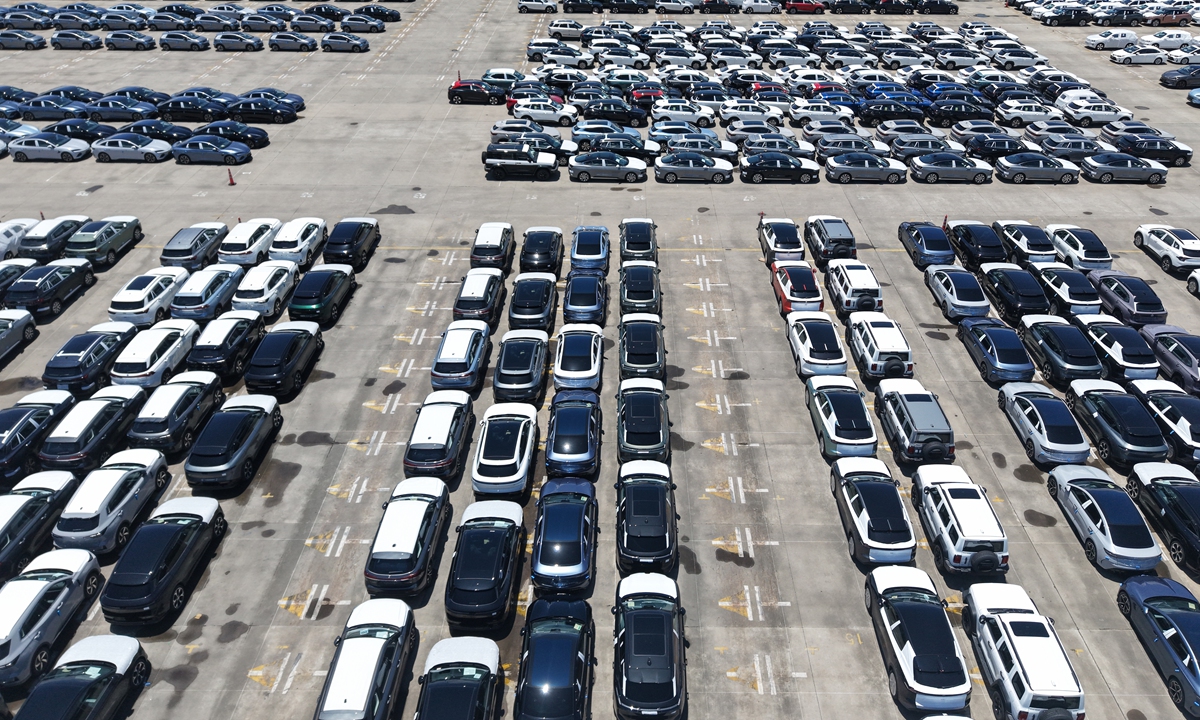A large number of new-energy vehicles waiting to be exported are parked at Shanghai Port on August 11, 2025. Photo: VCG