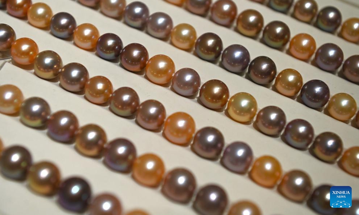 This photo taken on Aug. 9, 2025 shows pearl jewelry products at a trading center for jewelry products in Shanxiahu Town, Zhuji City of east China's Zhejiang Province. Shanxiahu Town of Zhejiang Province is renowned for its pearl industry that ranges from pearl farming, processing, trading to cultural tourism. (Xinhua/Mao Zhu)