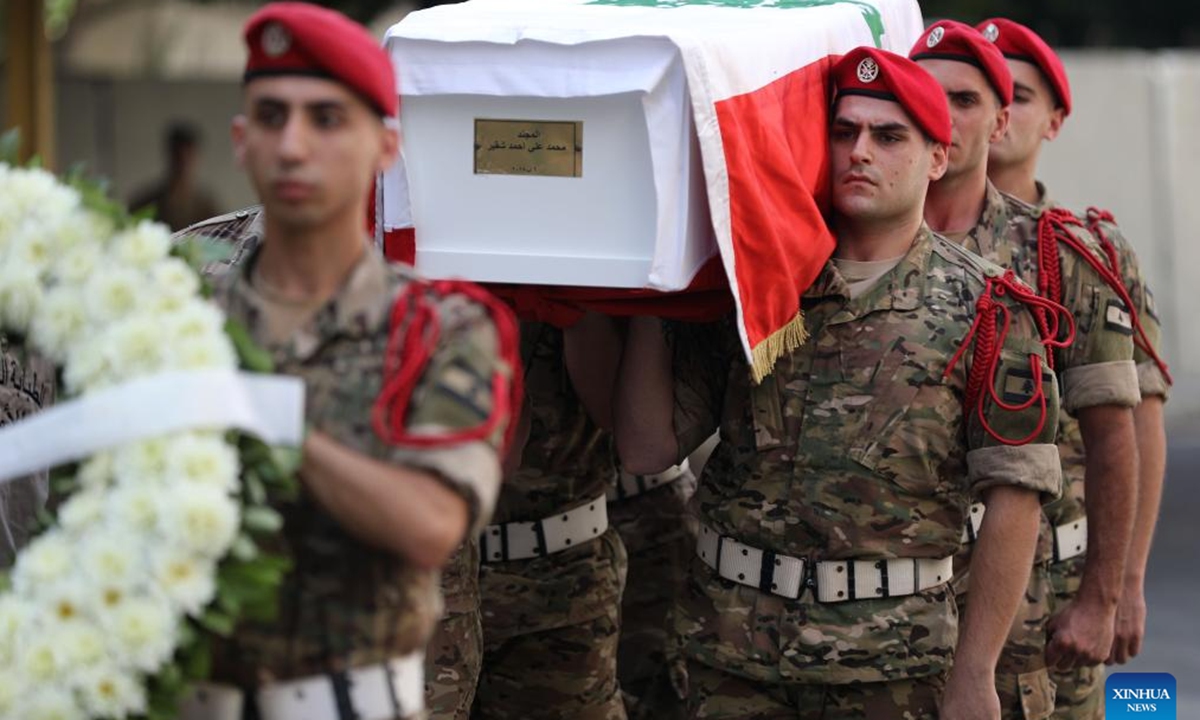 This photo taken on Aug. 10, 2025 shows the Lebanese army holding a mourning ceremony for one of the six soldiers killed in the explosion of an arms depot in the city of Tyre, in front of a military hospital in Beirut, Lebanon. Six Lebanese Army soldiers were killed and an unspecified number of others injured on Saturday when a weapons depot exploded during an inspection and dismantling operation carried out by an army unit in the city of Tyre, southern Lebanon. (Photo by Bilal Jawich/Xinhua)