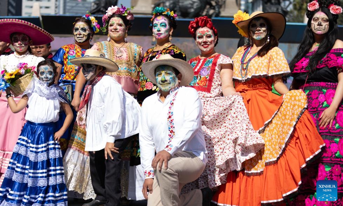 Actors in traditional costumes are pictured during a parade in commemoration of the International Day of the World's Indigenous Peoples in Mexico City, Mexico, Aug. 9, 2025. The International Day of the World's Indigenous Peoples is marked annually on Aug. 9, with this year's theme being Indigenous Peoples and AI: Defending Rights, Shaping Futures. (Xinhua/Li Mengxin)