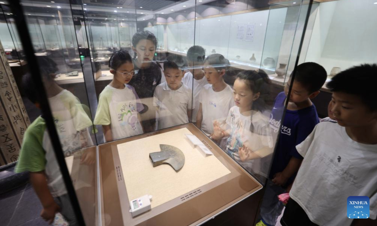  Children visit a museum in Yinan County of Linyi, east China's Shandong Province, Aug. 12, 2025. Children across China take part in various kinds of activities to spend their summer holiday. (Photo by Wang Yanbing/Xinhua)